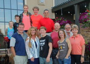 Robert and wife Lynda (front row, far right) with Jacobson family.